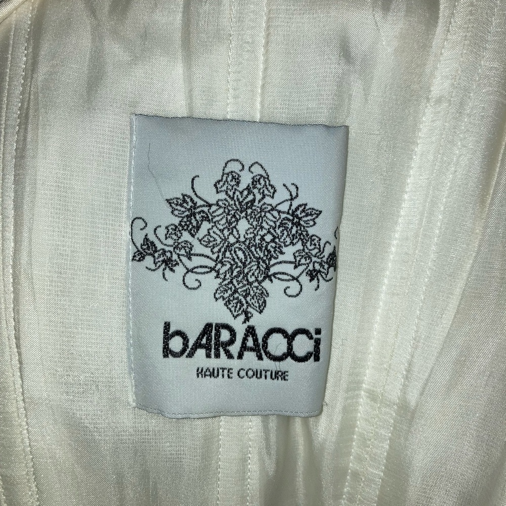 Brand new never worn can be worn as a wedding gown or either as a Evening gown